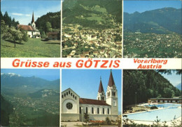 72092240 Goetzis Vorarlberg Totalansicht Panorama Kirche Schwimmbad Goetzis - Autres & Non Classés