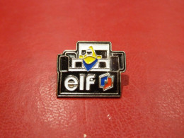 PIN'S " ELF EN F1 ". - F1