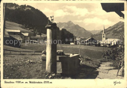 72085421 Riezlern Kleinwalsertal Vorarlberg Mit Widderstein Brunnen Kirche Lanse - Autres & Non Classés