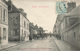 CPA Laigle-Rue Porte Rabel-Timbre         L2947 - L'Aigle