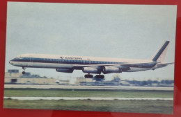 ADVERTISING POSTCARD - EASTERN AIRLINES DOUGLAS DC-8 LANDS AT MIAMI INTERNATIONAL AIRPORT IN 1969 - Zeppeline