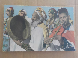 CPSM -  AU PLUS RAPIDE - ALGERIE - LE SUD ALGERIEN - DANSEUSES ET MUSICIENS -  VOYAGEE. 1960 NON TIMBREE - FORMAT CPA - Sonstige & Ohne Zuordnung