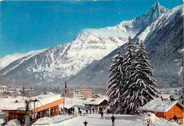 74 - Chamonix - Mont-Blanc - Le Téléski Du Savoy Et Les Drus - Chalets - Neige - Hiver - Flamme Postale - CPM - Voir Sca - Chamonix-Mont-Blanc