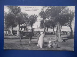 CPA CARTE POSTALE  - OUDJDA  ( MAROC  ) -  UN COIN DU MARCHÉ INDIGÈNE A TRAVERS LES OLIVIERS - Autres & Non Classés