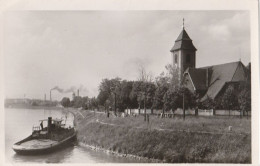 68 - HUNINGUE - L'Eglise Protestante Et Le Rhin (CPSM Petit Modéle) - Huningue