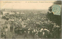 61.LA VIE NORMANDE.UN GRAND CHAMP DE FOIRE - L'Aigle