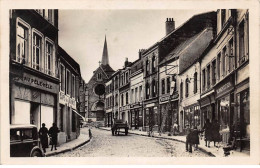 62 - Desvres - SAN22924 - Rue De L'Eglise - CPSM 14X9 Cm - Desvres