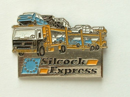 Pin's CAMION TRANSPORTS DE VOITURE - SILCOCK EXPRESS - Transports