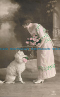 R150745 Old Postcard. Woman With Dog And Roses - World