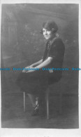 R150466 Old Postcard. Woman On The Chair - World