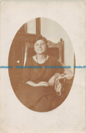 R150467 Old Postcard. Woman On The Chair - World