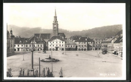 AK Bruck A. Mur, Ortspartie Mit Geschäften, Denkmal Und Brunnen  - Autres & Non Classés