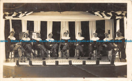 R155517 Old Postcard. Men Performance On The Stage - World