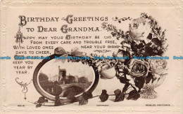 R155799 Birthday Greetings To Dear Grandma. Flowers In Vases. Beagles. RP. 1918 - Monde