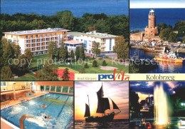 72379225 Kolobrzeg Polen Hotel Zdrojowy Leuchtturm Segelschiff Abendstimmung  - Pologne