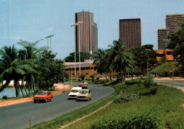 CPM - ABIDJAN - Le Plateau (voitures) - Photo JC.Nourault - Edition Barnoin - Côte-d'Ivoire