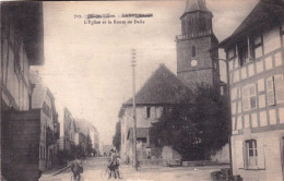 68 -  DANNEMARIE - L'église Et La Route De Delle - Dannemarie