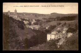 63 - ST-NECTAIRE - ROUTE DE LA VALLEE ET L'EGLISE - Saint Nectaire