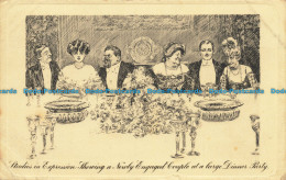 R649454 Studies Expression Showing A Newby Engaged Couple At A Large Dinner Part - World