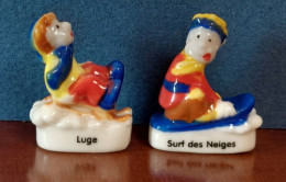 LES SPORTS D'HIVER - PASQUIER - "LA LUGE" Et "LE SURF DES NEIGES" - 2006 - Lot De 2 Fèves Brillantes - Dessins Animés