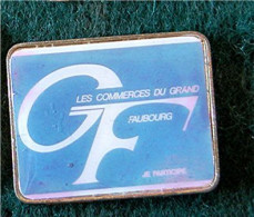 PIN'S " GF - LES COMMERCES DU GRAND FAUBOURG " CHARTRES _DP158 - Marques