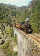 Trains - Trains - Chemin De Fer Du Vivarais - Ligne Tournon-Lamastre - Le Train Accroché à La Colline - CPM - Flamme Pos - Treinen