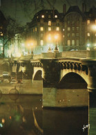 CPM - R - PARIS LA NUIT - LE PONT NEUF ET LA SEINE - Ponti