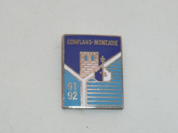 Pin's CONFLANS - MONTJOIE, 1991-1992 - Ciudades