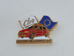 Pin's RENAULT CLIO, VOITURE DE L'ANNEE 91, Signé ARTHUS BERTRAND - Arthus Bertrand