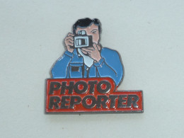 Pin's PHOTO REPORTER - Fotografie