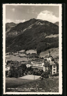 Cartolina Gossensass, Ortsansicht Mit Palace-Hotel Und Tennisplatz  - Autres & Non Classés