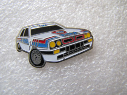 PIN'S    LANCIA DELTA  HF  INTÉGRALE  FINA  RALLYE - Other & Unclassified
