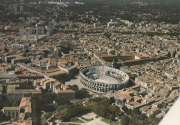 NIMES, VUE AERIENNE DES ARENES  COULEUR REF 16791 - Nîmes