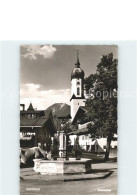 71939640 Garmisch-Partenkirchen Josefsplatz Brunnen Kirche Garmisch-Partenkirche - Garmisch-Partenkirchen