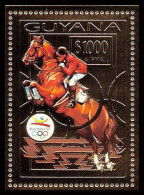 86157c/ Guyana Mi N°207 A Jeux Olympiques (olympic Games) BARCELONA 1992 Horse Jumping OR Gold ** MNH - Guyane (1966-...)