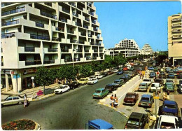 Cp A Saisir 34 La Grande Motte Avenue De L Europe Enseignes Radiola  Sauter Annees 1970 1980 - Other & Unclassified