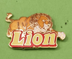Pin's LION Barre De Chocolat  Nestlé - Levensmiddelen
