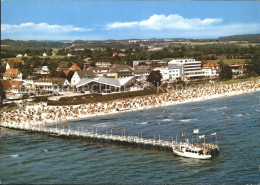 72333253 Scharbeutz Ostseebad Strand Steg Motorboot Fliegeraufnahme Scharbeutz - Scharbeutz