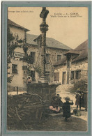 CPA (19) GIMEL - Aspect De La Vieille Croix Sur La Grand'Place En 1910 - Carte Colorisée - Autres & Non Classés