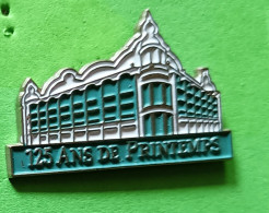 Pin's 125 Ans De Printemps Grands Magasins - Marche