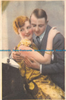 R162894 Old Postcard. Woman With Man - World