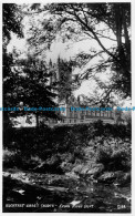 R167234 Buckfast Abbey Church. From River Dort. Photochrom - Monde