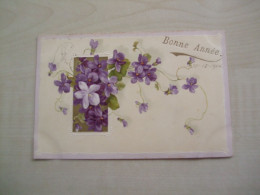 Carte Postale Ancienne 1906 En Relief VIOLETTES Bonne Année - Fleurs