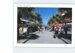 71850786 Bugibba Strassenpartie Palmen Souvenirladen Malta - Malte