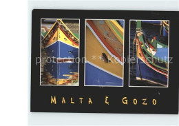 71850782 Gozo Malta Brightly Coloured Boats Gozo Malta - Malte