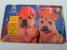 INDONESIA CHIPCARD 140 UNITS /DOGS/ PARTY DOGS       / Fine Used Card   **16741 ** - Indonesië