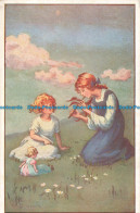 R670776 Woman And Girl Sitting In The Grass. R. N - Monde