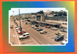 88 EPINAL La Gare Routiere La Gare SNCF  Voitures Carte Vierge TBE - Epinal