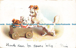 R674698 The Dog Pushes The Cart With Two Dogs Inside. Postcard. 1904 - World