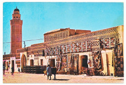 CPSM / CPM 10.5 X 15 Tunisie TOZEUR L'entrée De La Ville   Marchand De Tapis  Mosquée Minaret - Tunisie